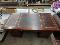 Wood executive desk with leather-like inserts, 7 drawers, 31inHx72inWx35inD