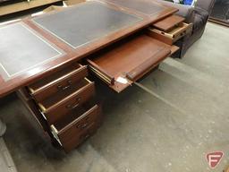 Wood executive desk with leather-like inserts, 7 drawers, 31inHx72inWx35inD