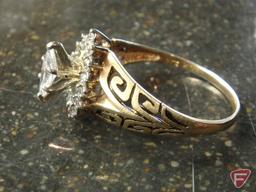 Ladies 14 K yellow gold diamond ring, center stone marquise cut Diamond .34 Pt. TW.; accent stones