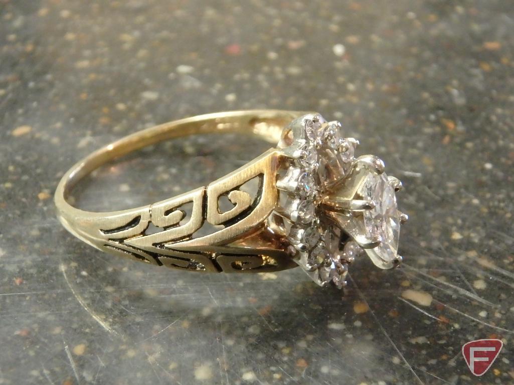 Ladies 14 K yellow gold diamond ring, center stone marquise cut Diamond .34 Pt. TW.; accent stones