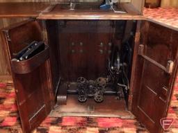 Damascus treadle sewing machine in cabinet, 23-1/2"x18"x29"H