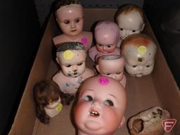 Doll parts, porcelain/ceramic heads, porcelain eyes, porcelain/ceramic limbs.