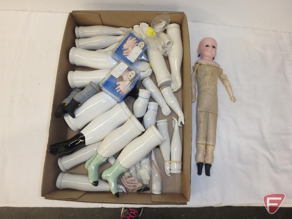 Doll parts, porcelain/ceramic heads, porcelain eyes, porcelain/ceramic limbs.