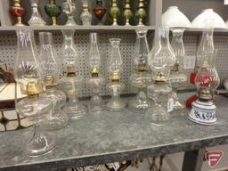 Glass hurricane oil lamps, 14inH to 20inH. 10 pieces