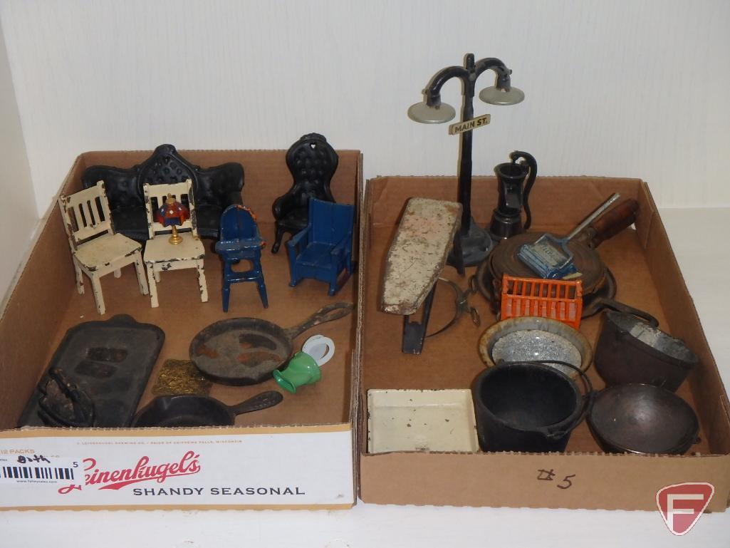 Metal and cast iron miniature/doll items, skillets, kettles, ironing board, street light, hand pump,