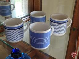 Blue glass vases, stemware, and votive holders, mugs, and brass figurines, candle holders,