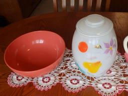 Pink/white Pyrex dishes, Nouvelle Pottery watering swan, glass cookie jar, melmac saucers, cups,