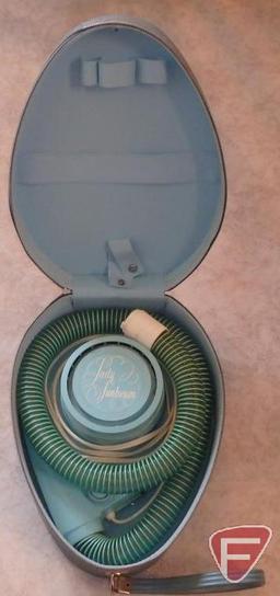 Pyrex casseroles, melmac dishes, Sunbeam hair dryer, kitchen utensils. All in aqua color.