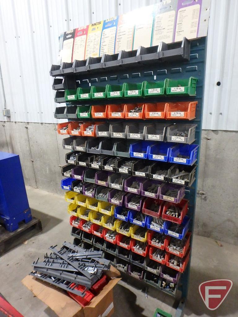 Wheel balancer weight organizer rack with contents: sorted wheel weights