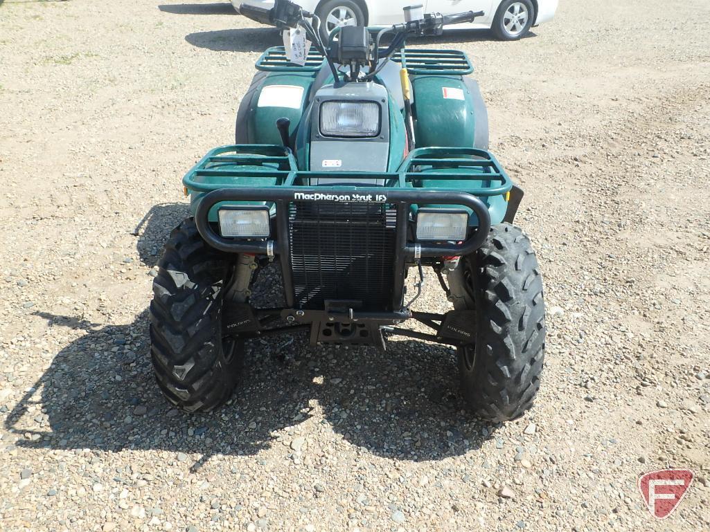 1998 Polaris Magnum 4x4 ATV with 5 ft. snow plow blade