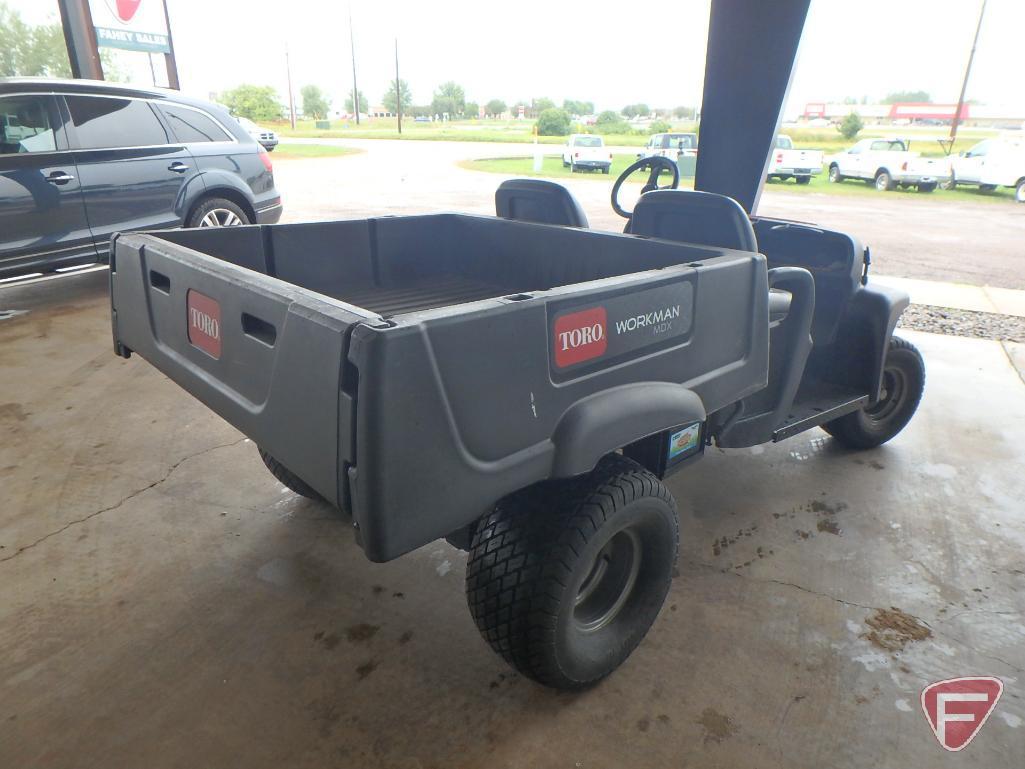 Toro Workman MDX gas 2WD utility vehicle with manual poly dump box, lights, 120 hrs