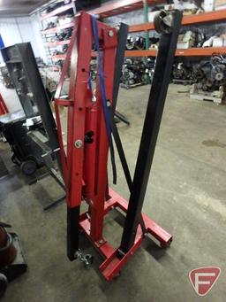 2 Ton engine hoist with fold up stabilizer arms on steel casters