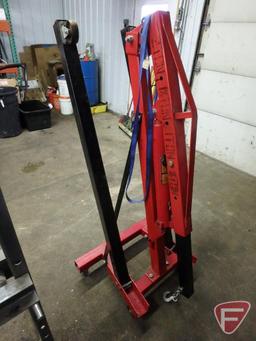 2 Ton engine hoist with fold up stabilizer arms on steel casters