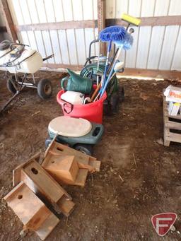 Bird houses, garden hose cart, garden hose, plastic bushel tub, sprinkler head, hand sprayer