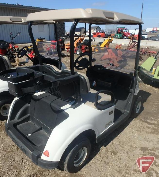 2016 EZ-GO RXV electric golf car with canopy, windshield, and cooler; white