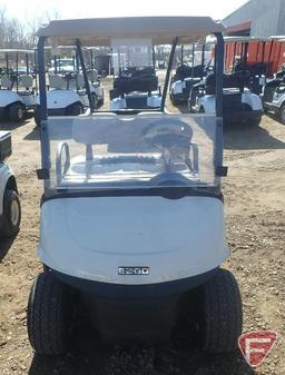 2016 EZ-GO RXV electric golf car with canopy, windshield, and cooler; white