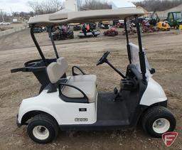 2016 EZ-GO RXV electric golf car with canopy, windshield, and cooler; white