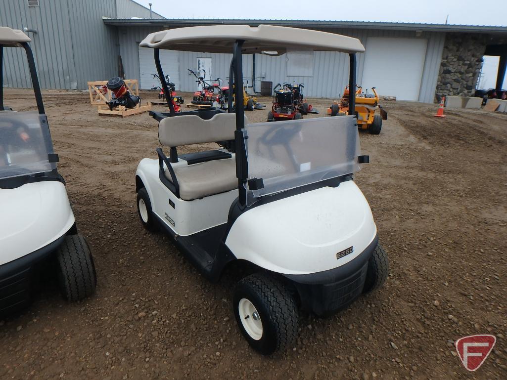 2016 EZ-GO RXV electric golf car with canopy, windshield, and cooler; white