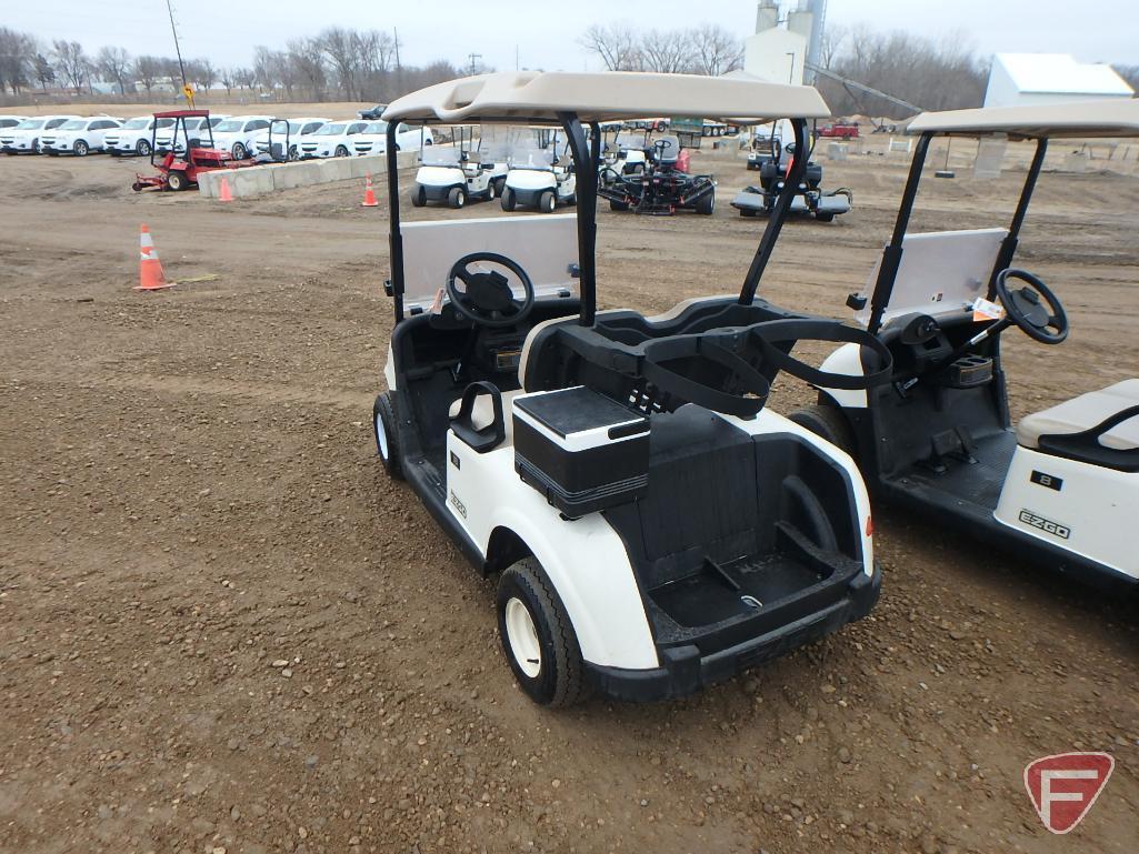 2016 EZ-GO RXV electric golf car with canopy, windshield, and cooler; white