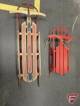 (2) wood sleds with metal runners, largest is Royal Racer 54inL. Both