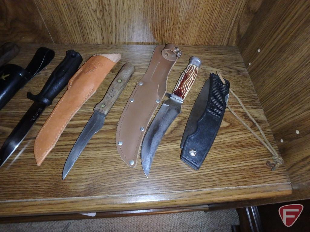 Knives: Brasil, Gerber, and others, most have sheaths. Contents of shelf.