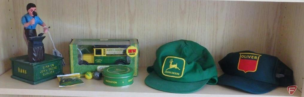 John Deere banks, hat, coasters, marbles, candy and Oliver hat