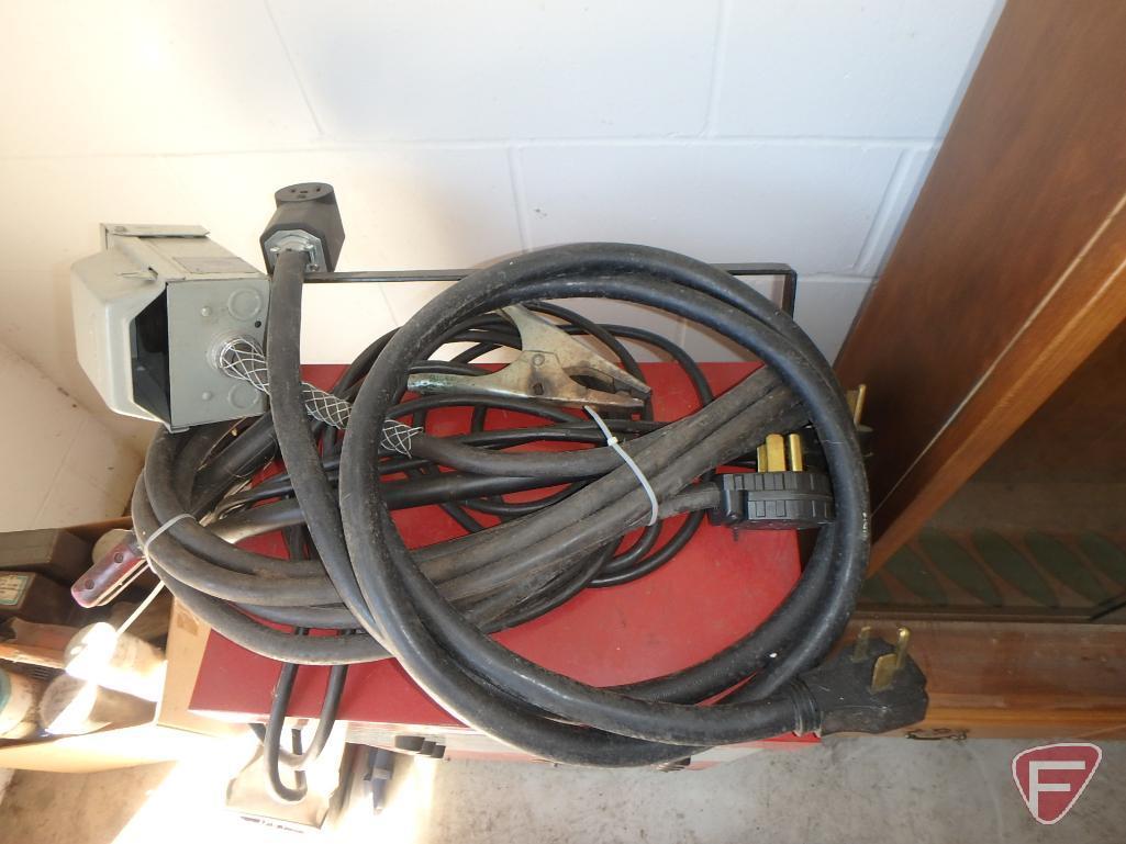 Century AC-DC 250A welder, 220V, with cables, welding rods and helmet