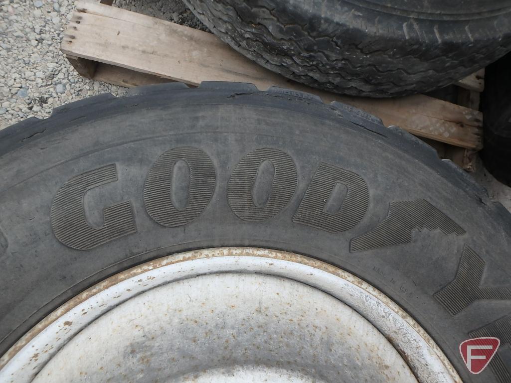 (2) Goodyear tires 11 r 22.5, one mounted on a rim
