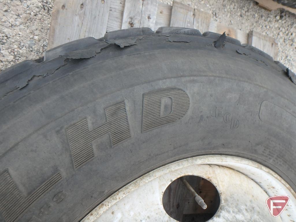 (2) Goodyear tires 11 r 22.5, one mounted on a rim