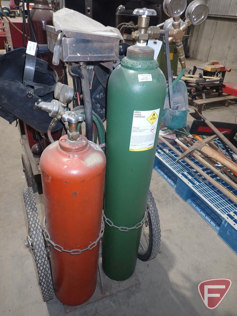 Torch kit on cart, acetylene oxygen tank, Airco gauges