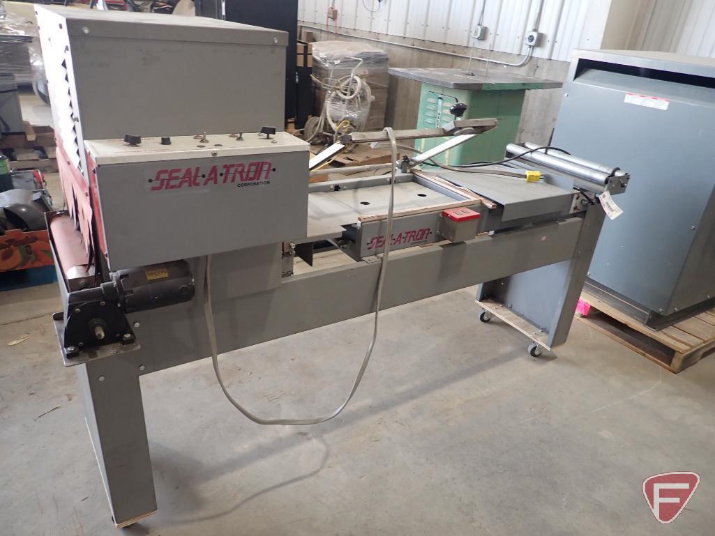 SEAL-A-TRON shrink wrap machine, model ECOMO LITE, sn 15029023, with Baldor electric motor, 110v