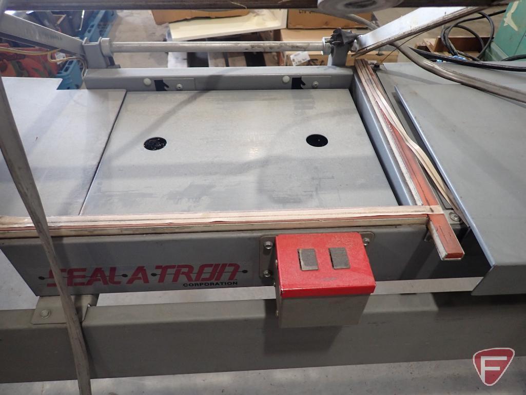 SEAL-A-TRON shrink wrap machine, model ECOMO LITE, sn 15029023, with Baldor electric motor, 110v