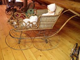 (2) VINTAGE STROLLERS/BUGGIES, DOLLS; THIS LOT IS LOCATED IN THE