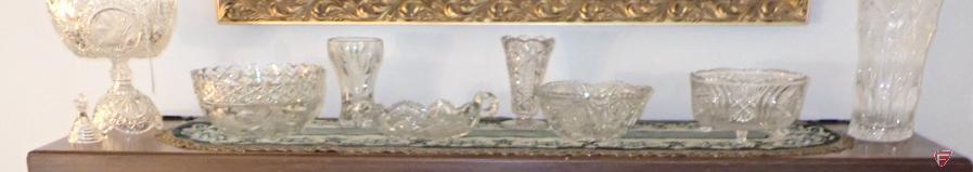Clear cut glass and crystal items. All items on top of fireplace