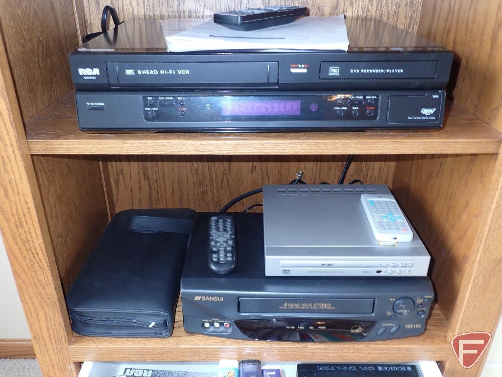 RCA vcr, Sansui VHS, movies, music, dvd player, LG wireless soundbar, LG speaker, child statues