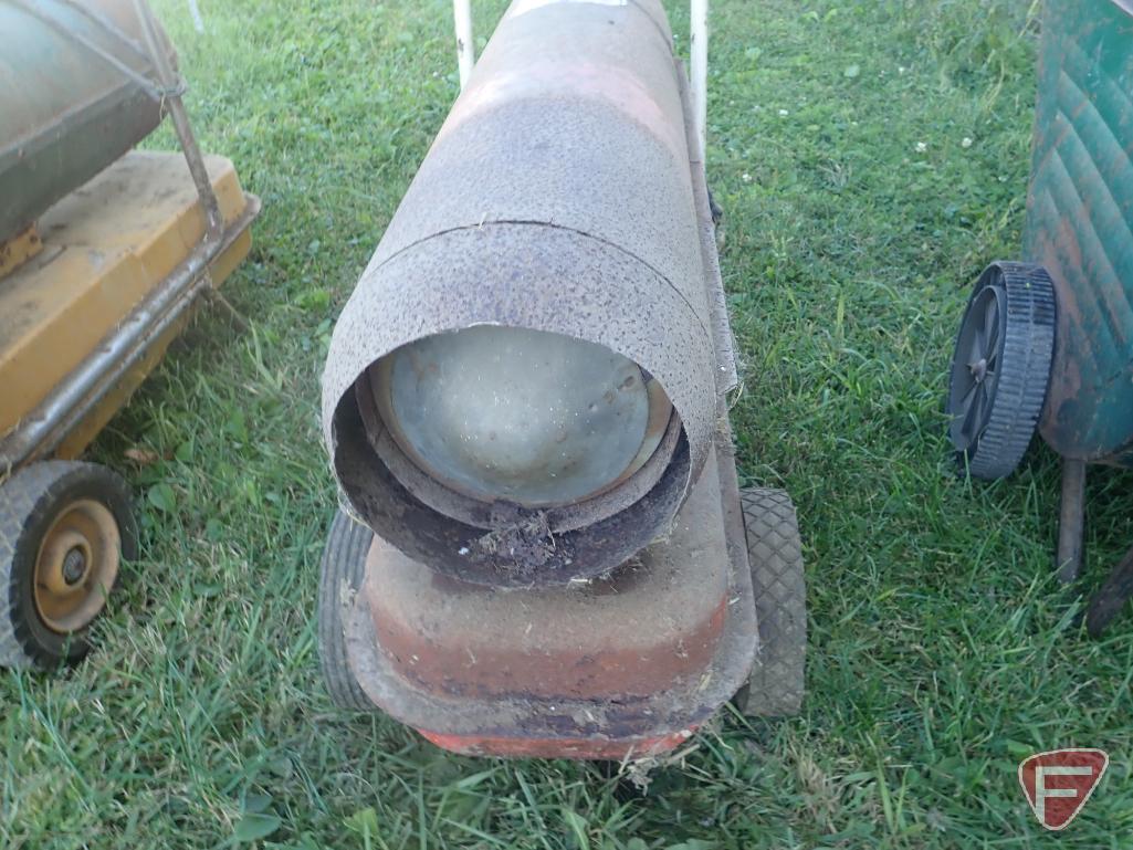 (2) KEROSENE SPACE HEATERS, 2 WHEEL CART, (2) VINTAGE STEEL WHEELS