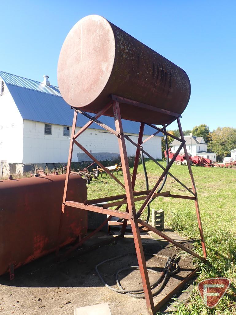 FUEL BARREL ON STAND, 38"D X 67"L, OVAL FUEL BARREL, 24"W X 70"T X 60"L