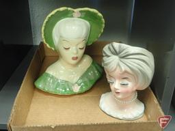 Head vases, girl with pink hat is 6"h, lady with green hat 8"h. 2 boxes