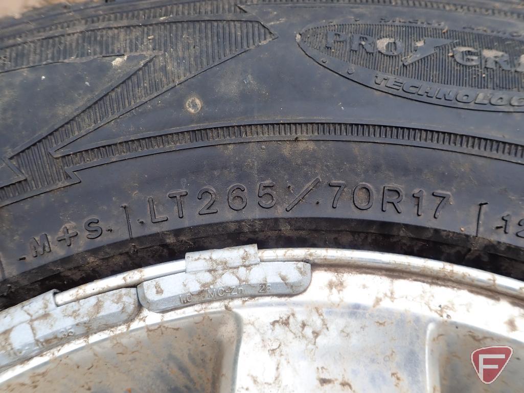 (4) Goodyear Wrangler tires, LT265/70R17, on aluminum 8 bolt rims, came off a Ram truck