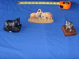 Carved wooden and pewter figures