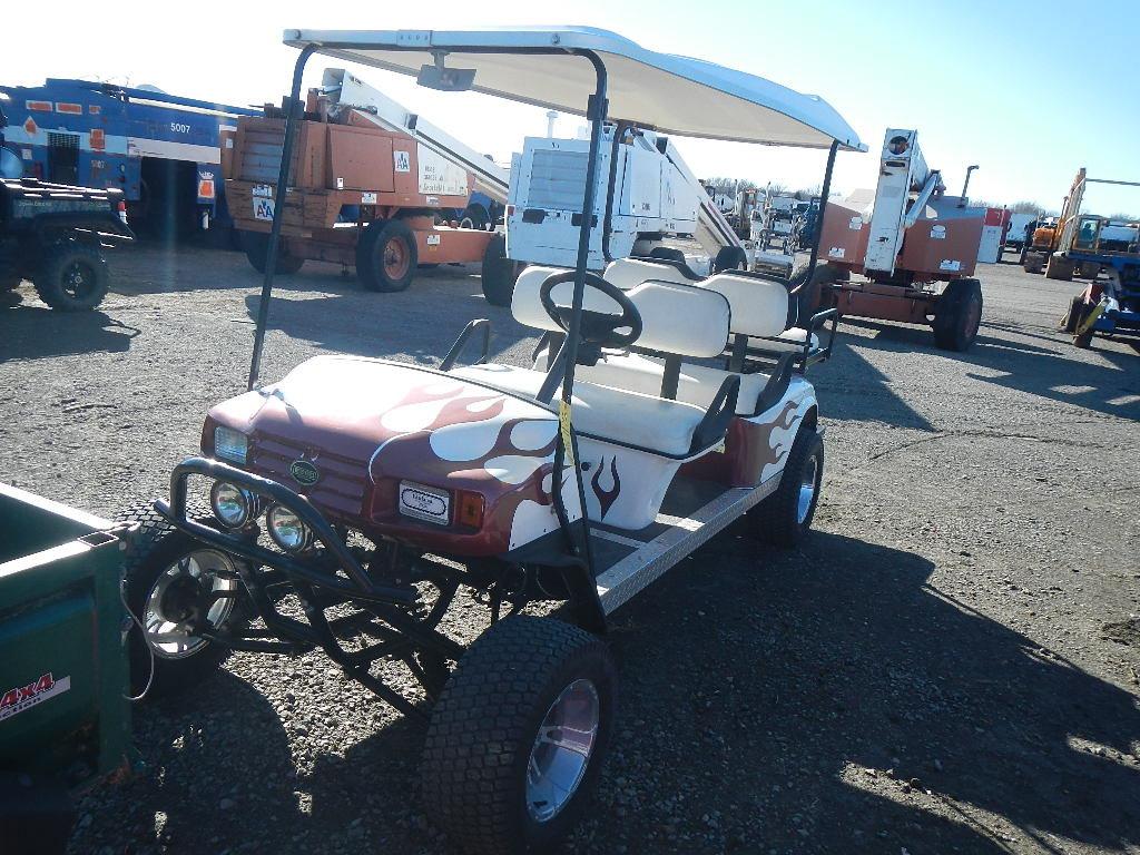 EZGO FOUR SEATER GOLF CART,  GAS POWERED, CUSTOM ALUMINUM WHEELS, FIBERGLAS