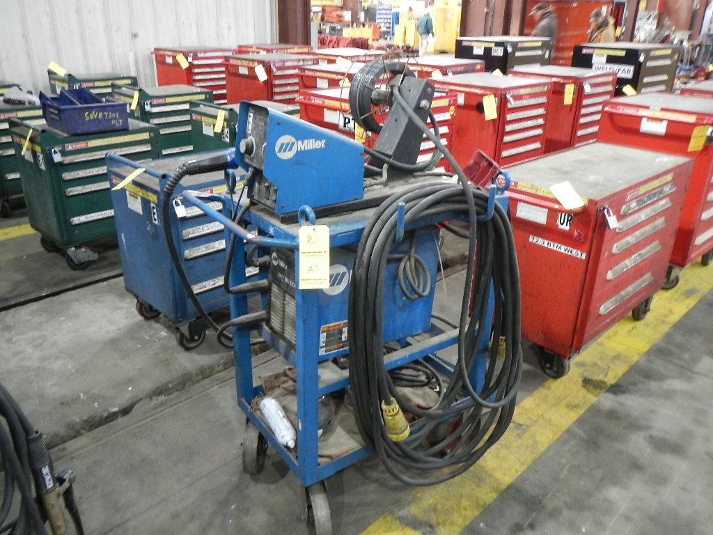 MILLER XMT-350 WELDER WITH MILLER 70 SERIES WIRE FEEDER,  MIG GUN, MOUNTED