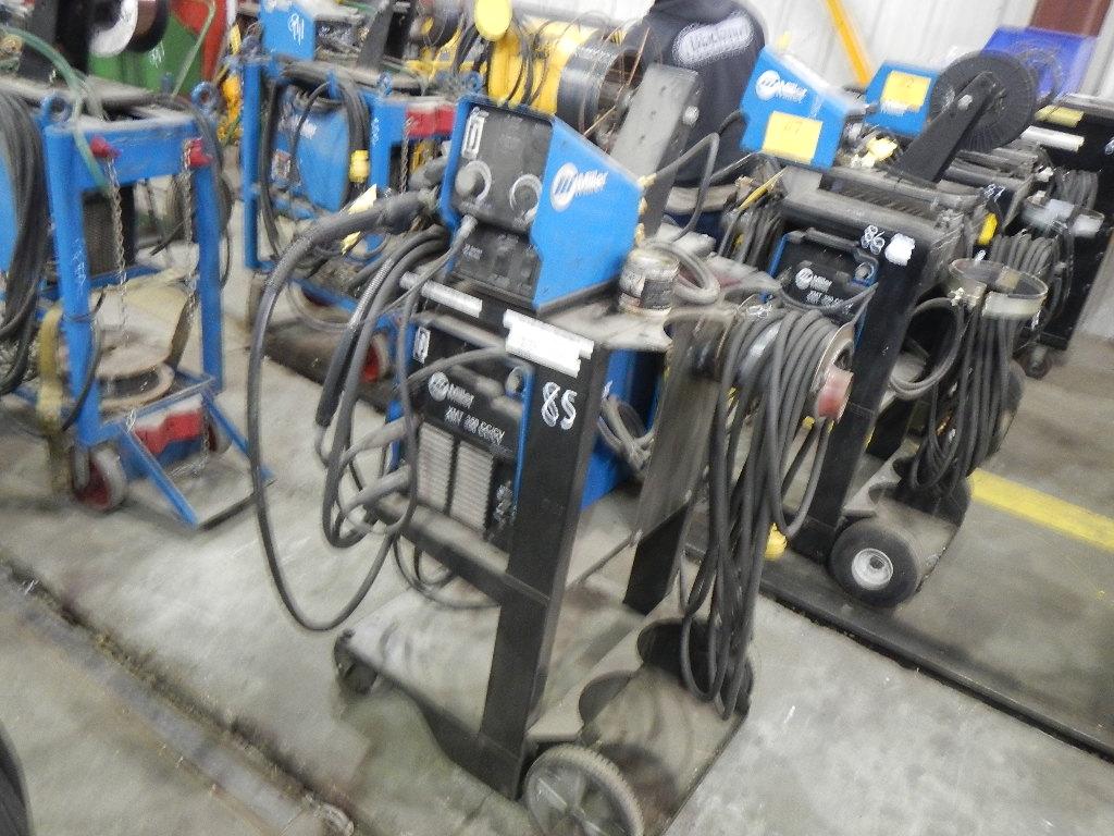 MILLER XMT-350 WELDER WITH MILLER 70 SERIES WIRE FEEDER,  MIG GUN, MOUNTED