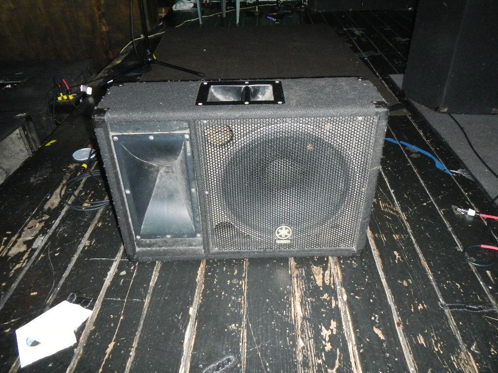 ALL ITEMS ON STAGE FLOOR TO INCLUDE SOUND SYSTEM, MICS, STAND, SPEAKERS  &