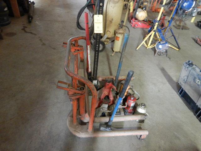 LOT WITH WHEEL DOOLY, JACK STANDS, BOTTLE JACKS AND MISC