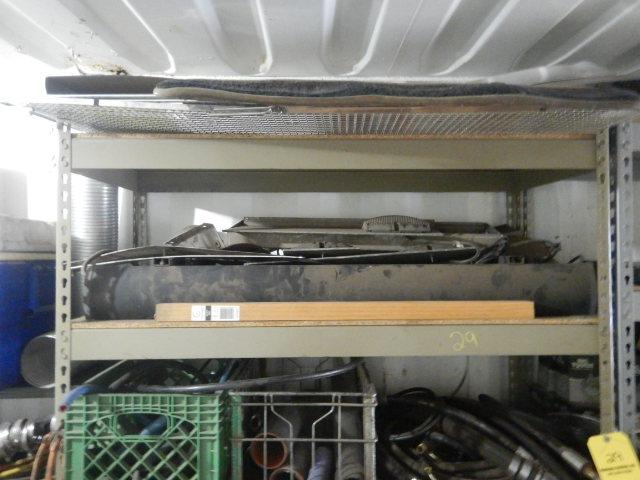 (1) SECTION OF METAL SHELVING WITH HYDRAULIC HOSES AND TRUCK PARTS