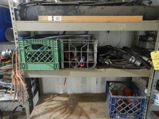 (1) SECTION OF METAL SHELVING WITH HYDRAULIC HOSES AND TRUCK PARTS