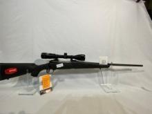 SAVAGE MODEL 111 25/06 like new in box, appears unfired. Comes with Bushnel