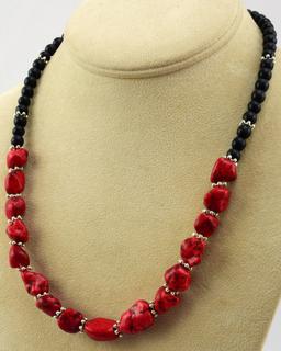 CORAL AND BLACK BEADS