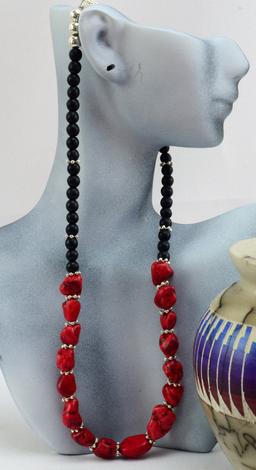 CORAL AND BLACK BEADS